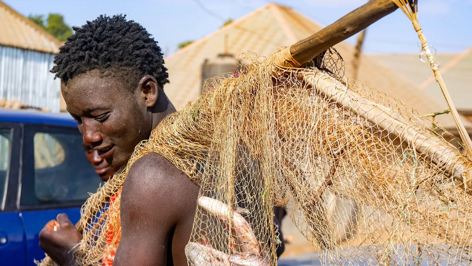 Fisherman with a traditional net at the Argungu Fishing Festival
